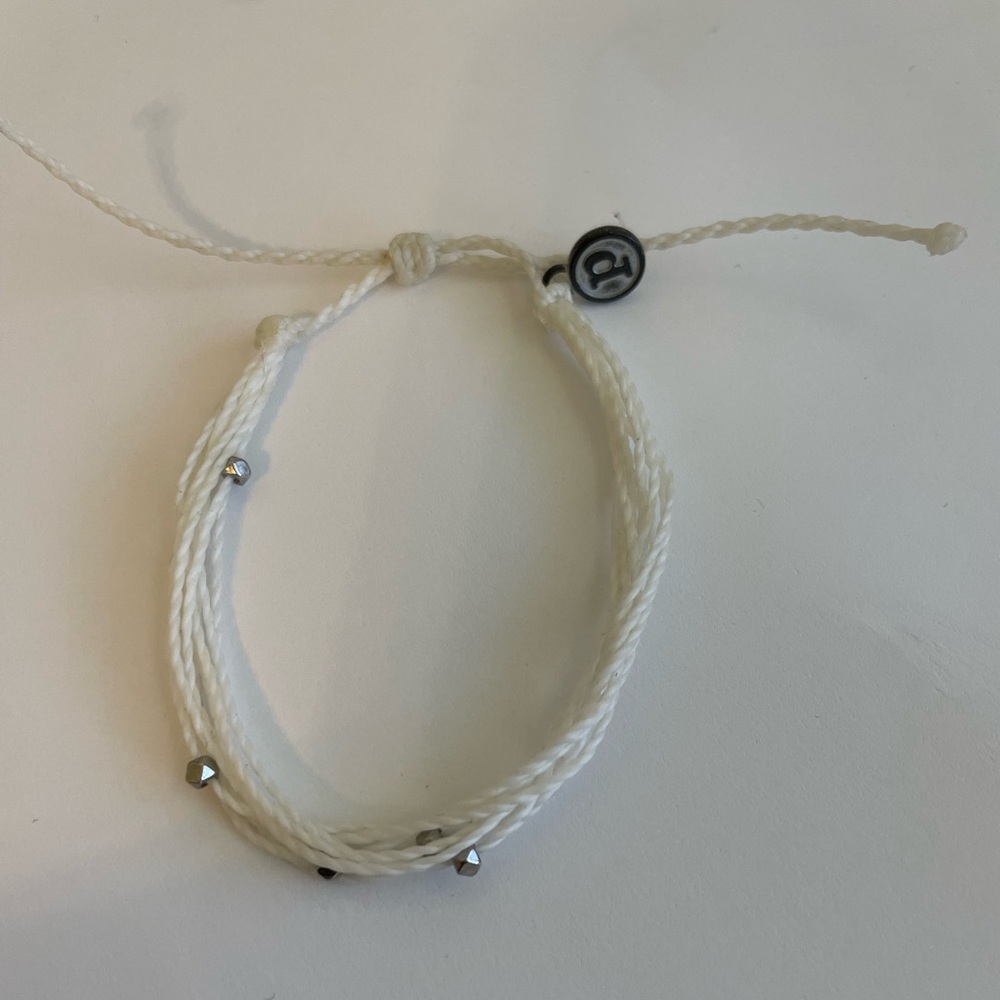 White beaded pura vida bracelet